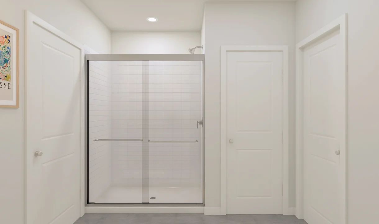 Glass shower enclosure in primary bath