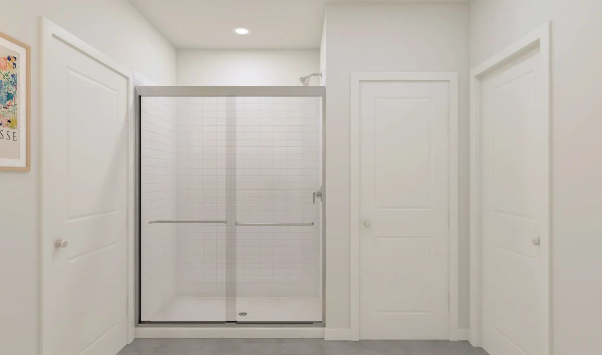 Glass shower enclosure in primary bath