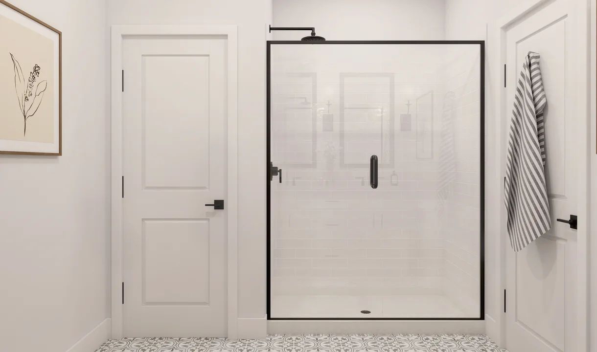 Primary bath with glass shower enclosure