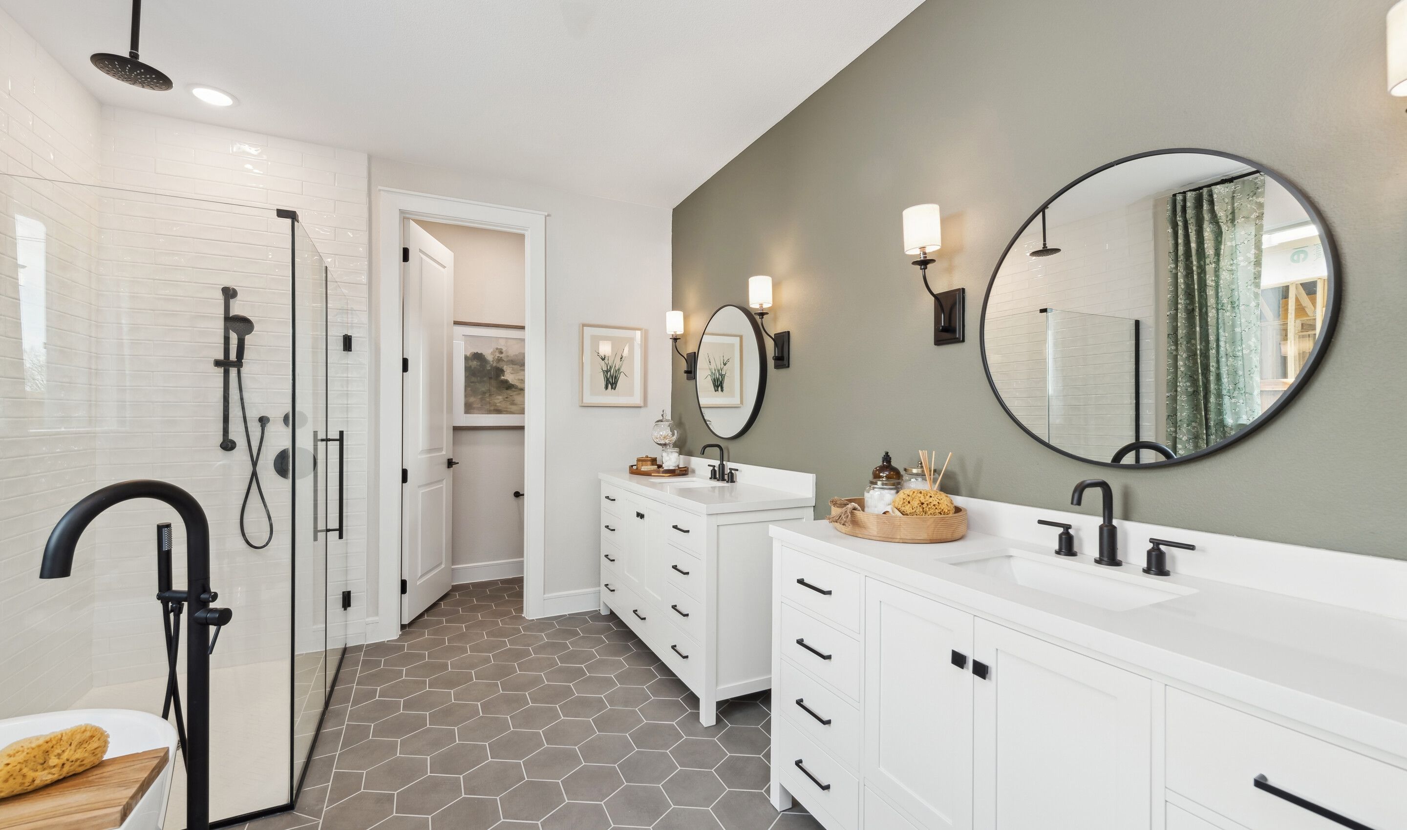 Primary bath with matte black fixtures and hardware