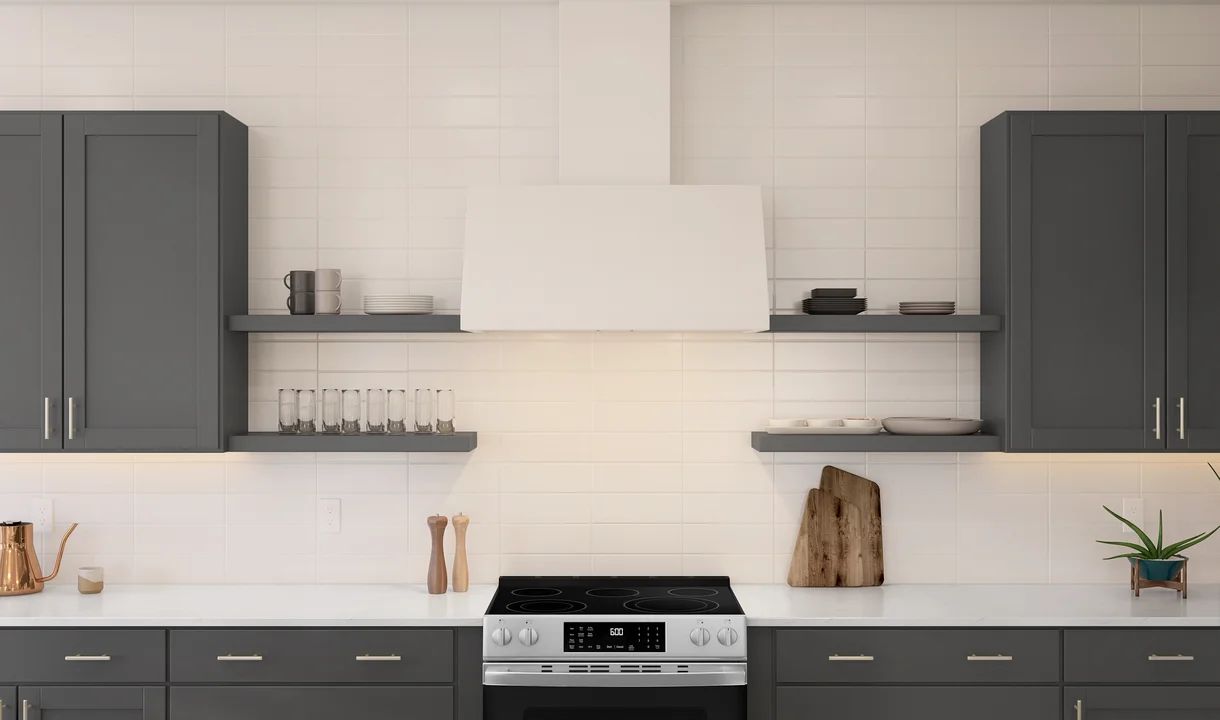 Kitchen with floating shelves and white subway tile backsplash