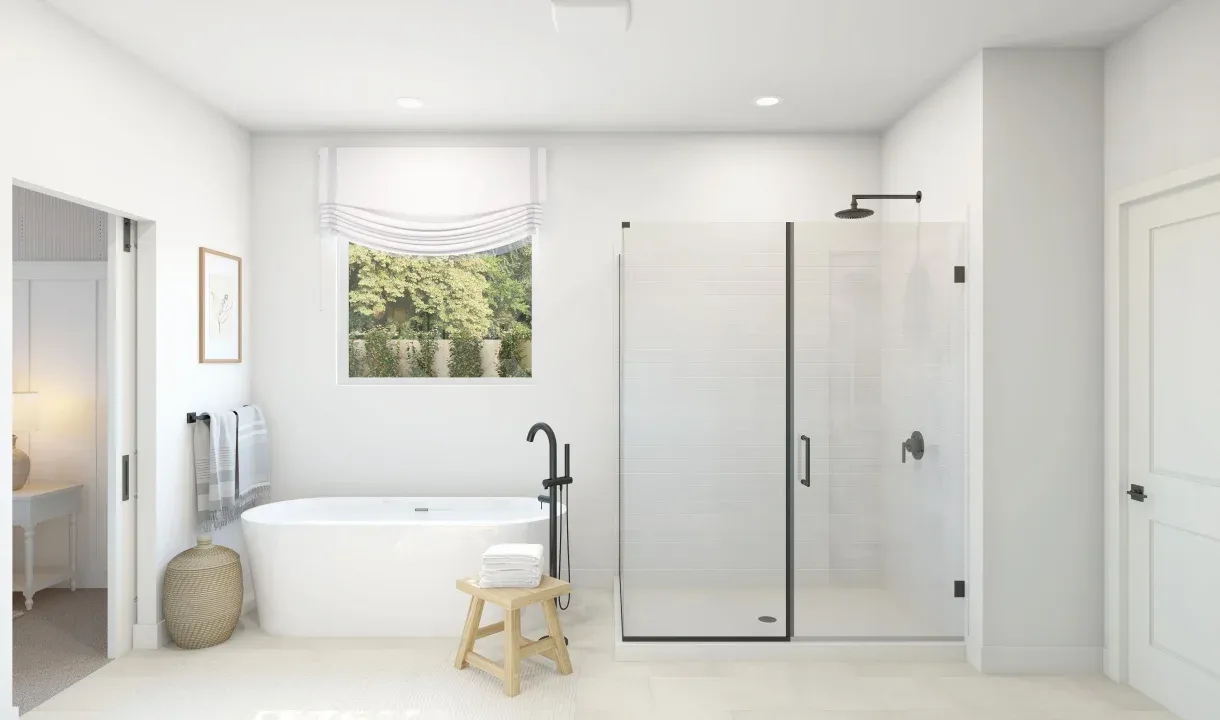 Primary bath with glass shower enclosure and freestanding tub