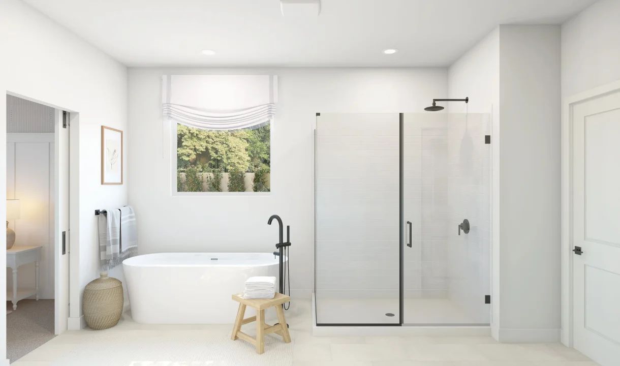 Primary bath with glass shower enclosure and freestanding tub