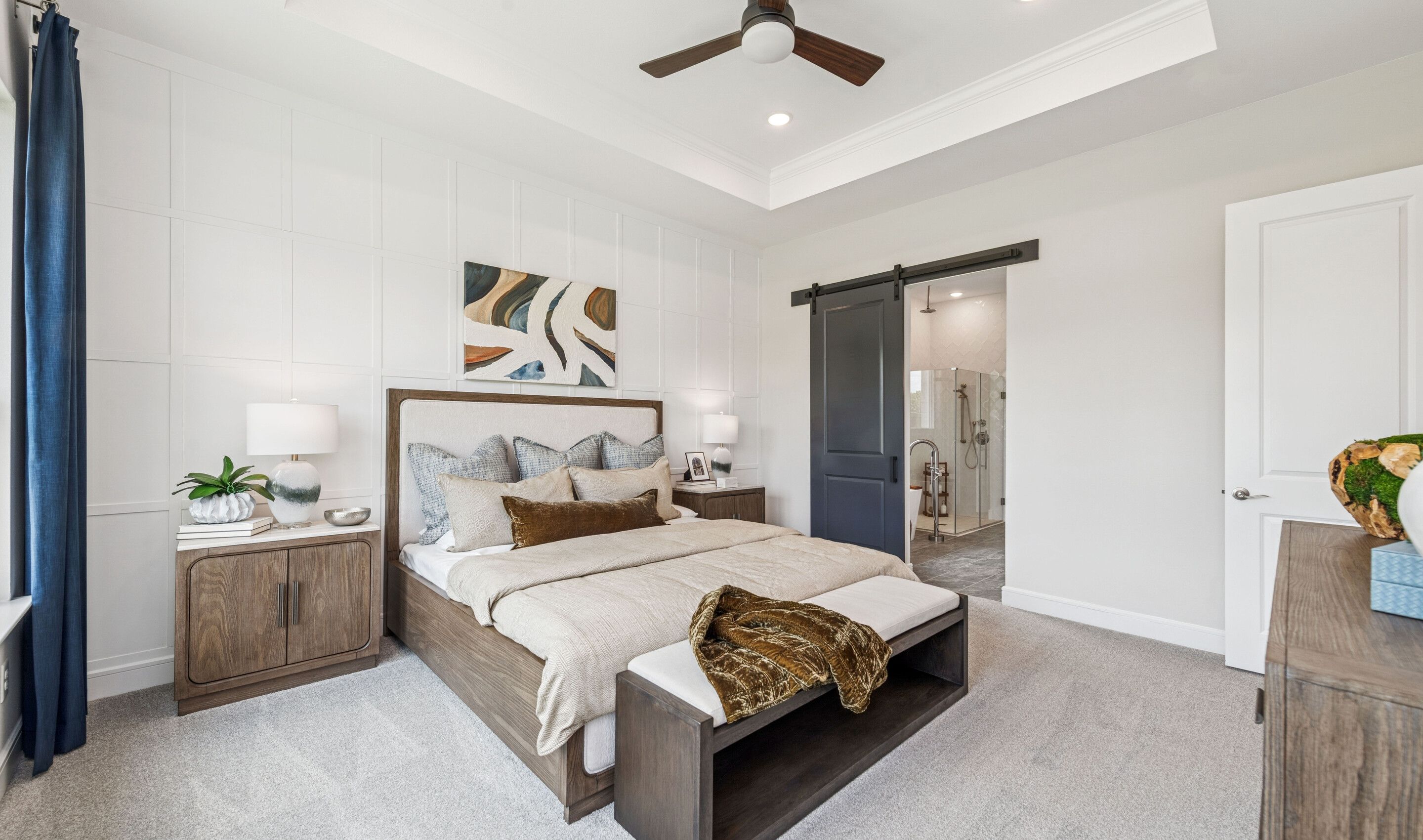 Primary suite with decorated feature wall