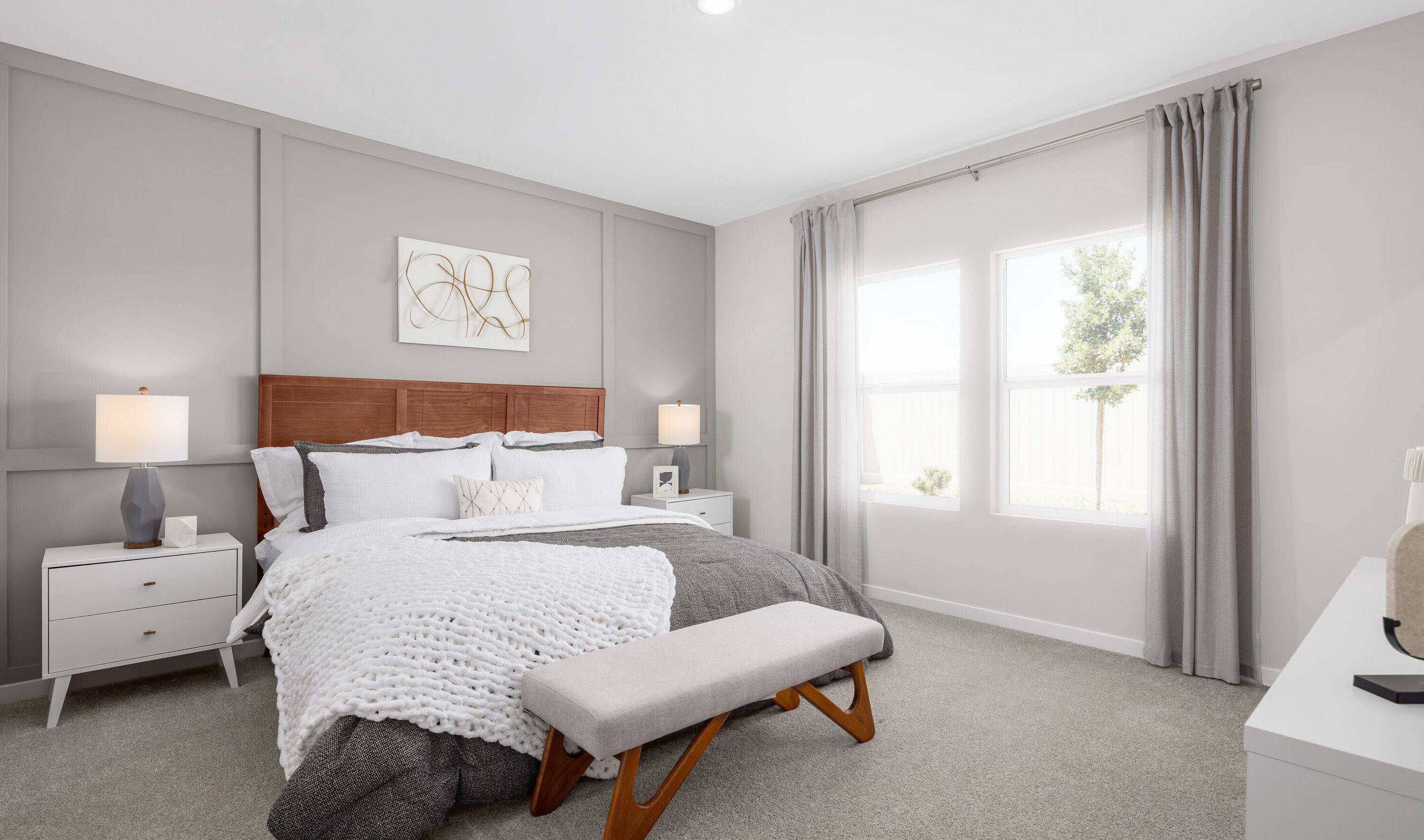 Primary suite with decorated feature wall