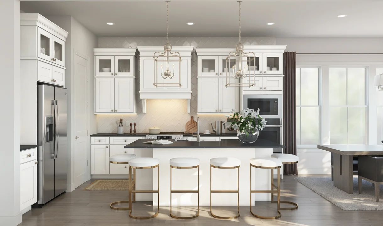 Kitchen with pendant lights & vast island