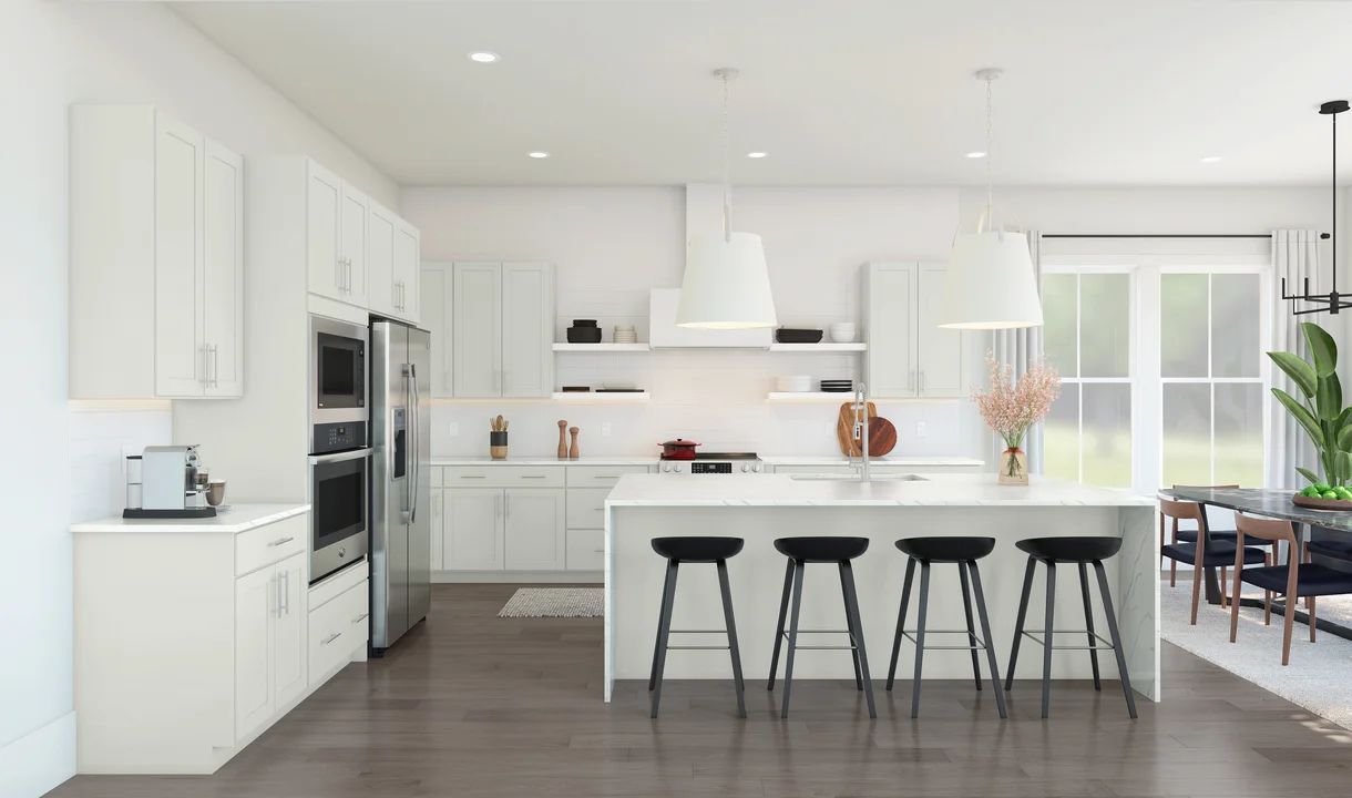 Kitchen featuring vast island & pendant lights