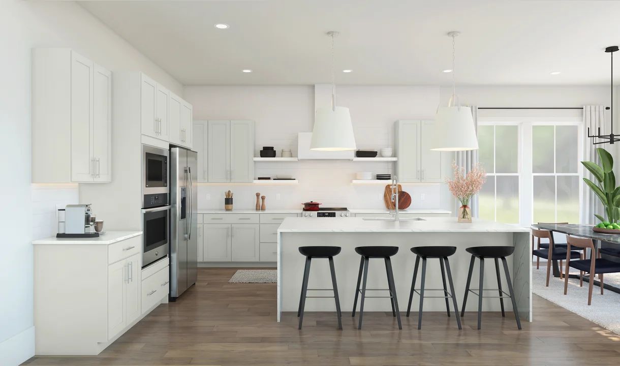 Kitchen featuring vast island & pendant lights