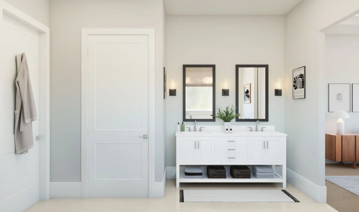 Primary bath featuring freestanding vanity with dual sinks