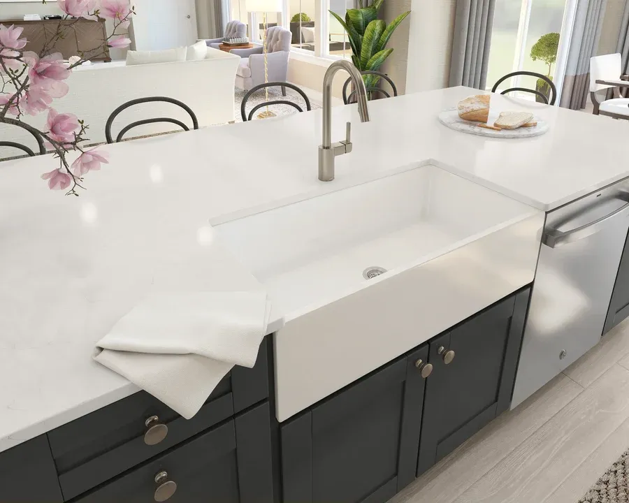 Kitchen with white apron-front sink and brushed nickel fixtures