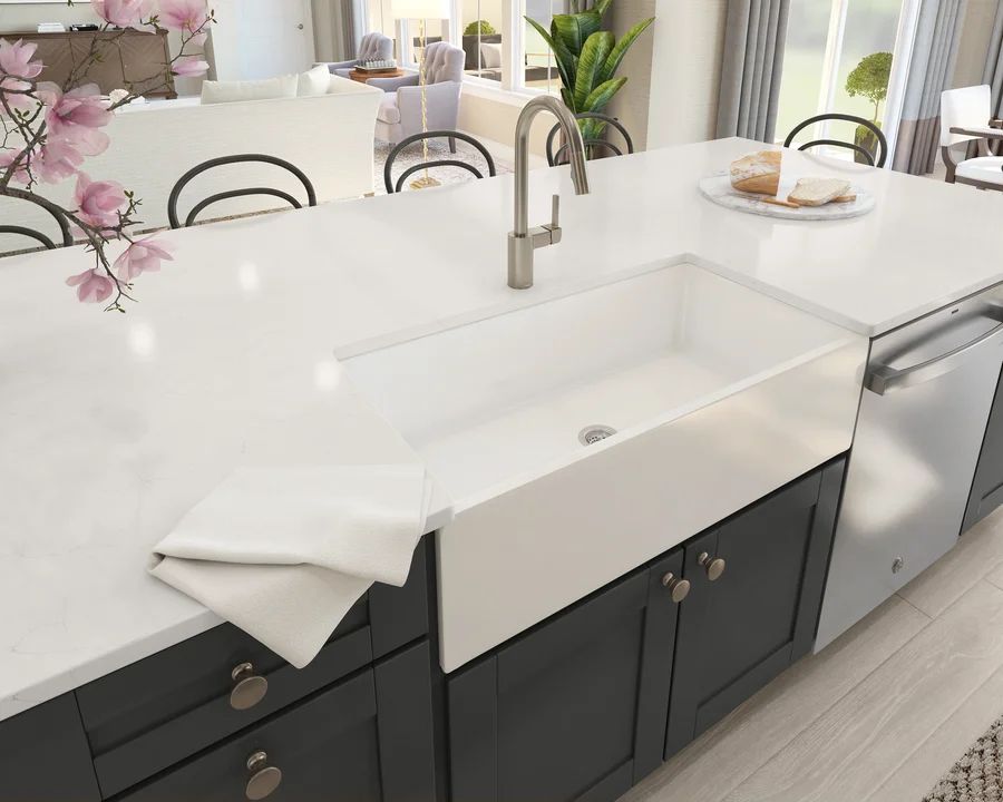 Kitchen with white apron-front sink and brushed nickel fixtures