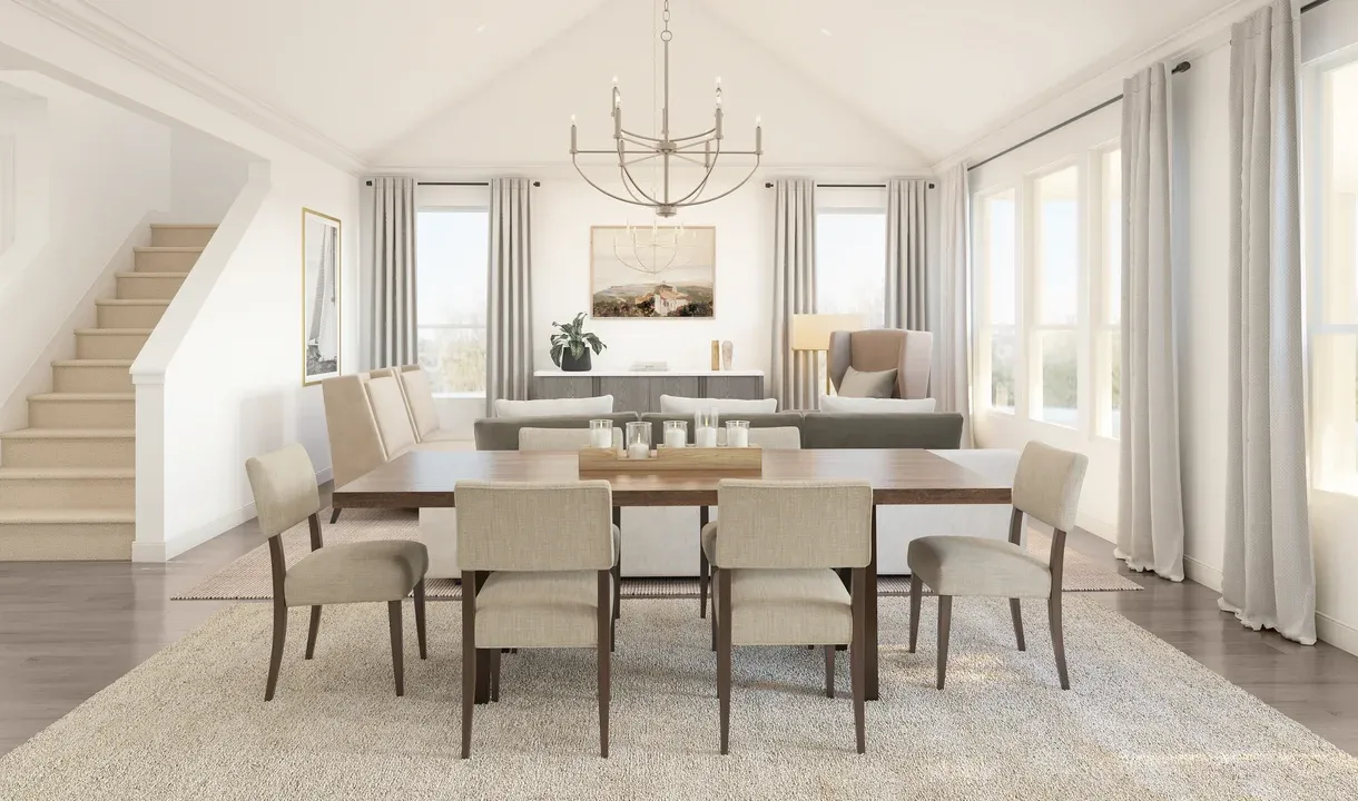 Dining area with vaulted ceiling and chandelier