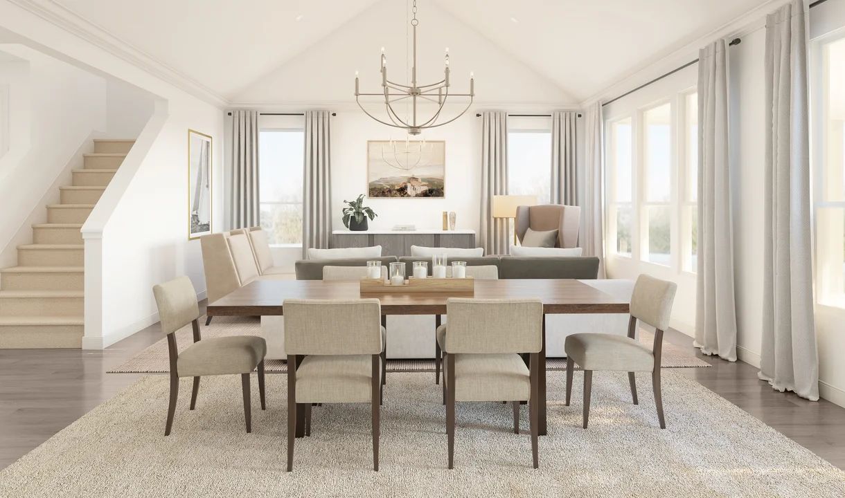 Dining area with vaulted ceiling and chandelier