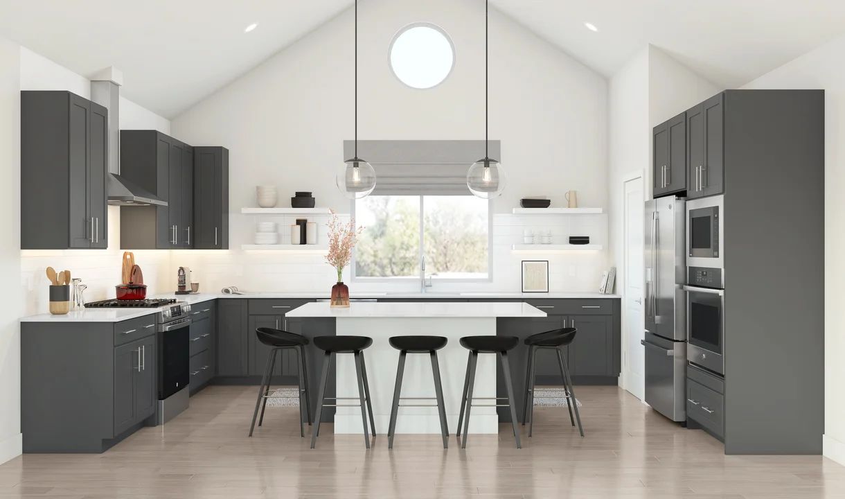 Kitchen with vaulted ceiling and pendant lighting