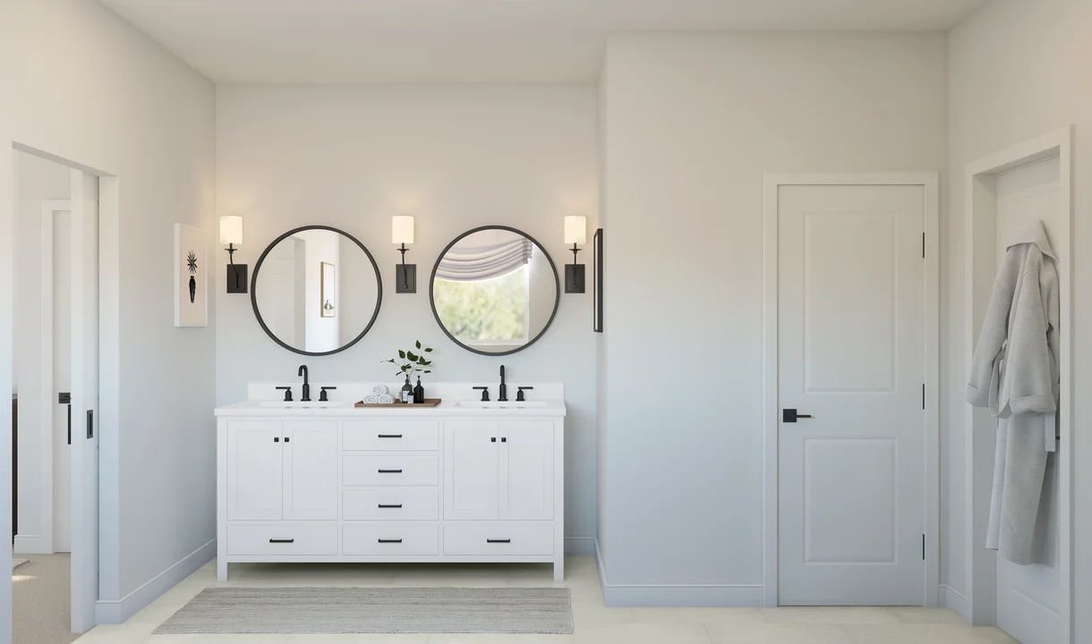 Primary bath with freestanding vanity and matte black fixtures