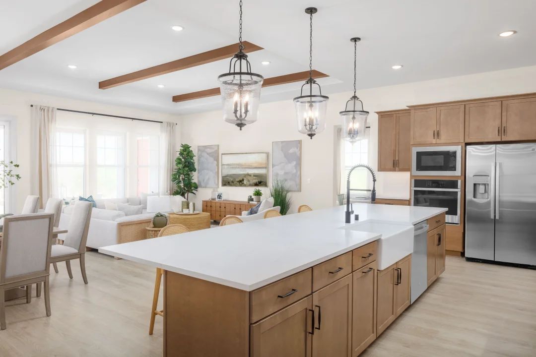 Kitchen with matte black hardware and stained cabinets