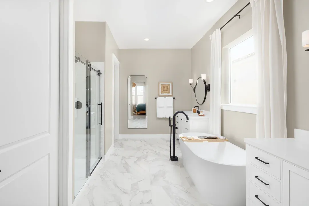 Primary bath with glass shower enclosure
