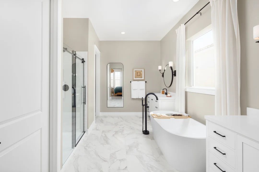 Primary bath with glass shower enclosure