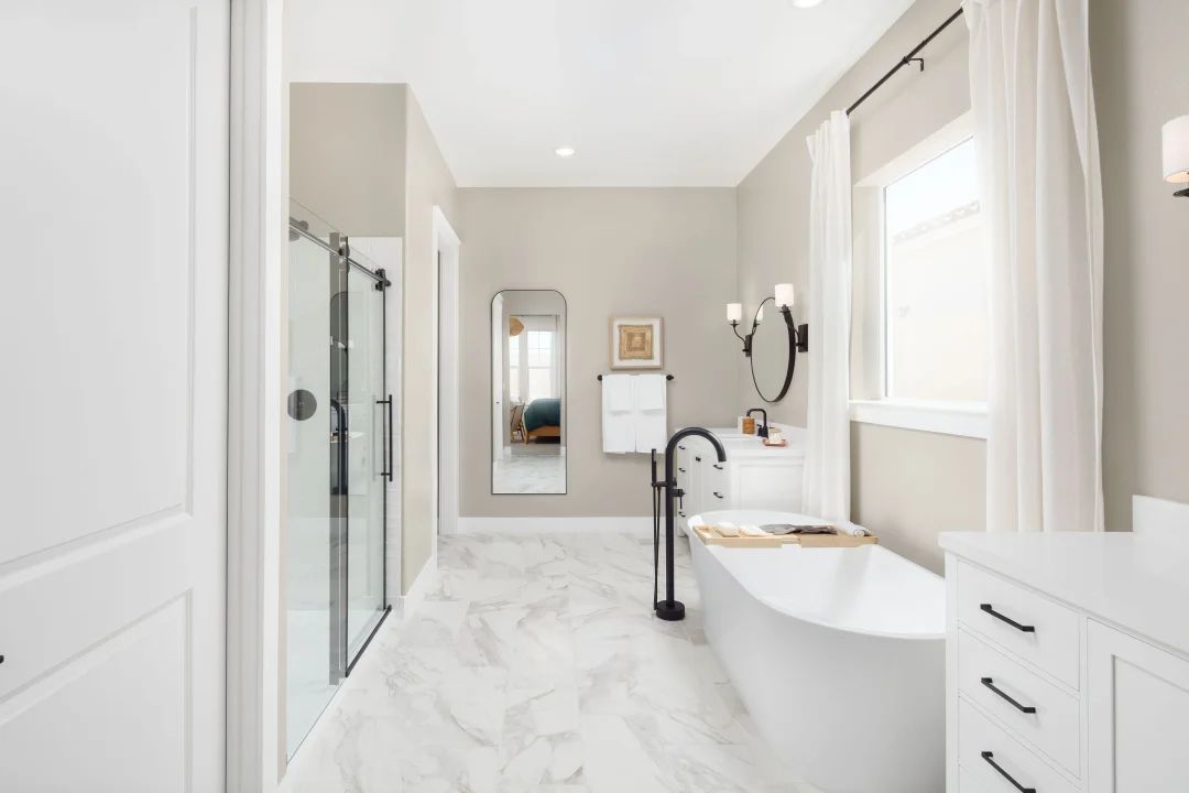 Primary bath with glass shower enclosure