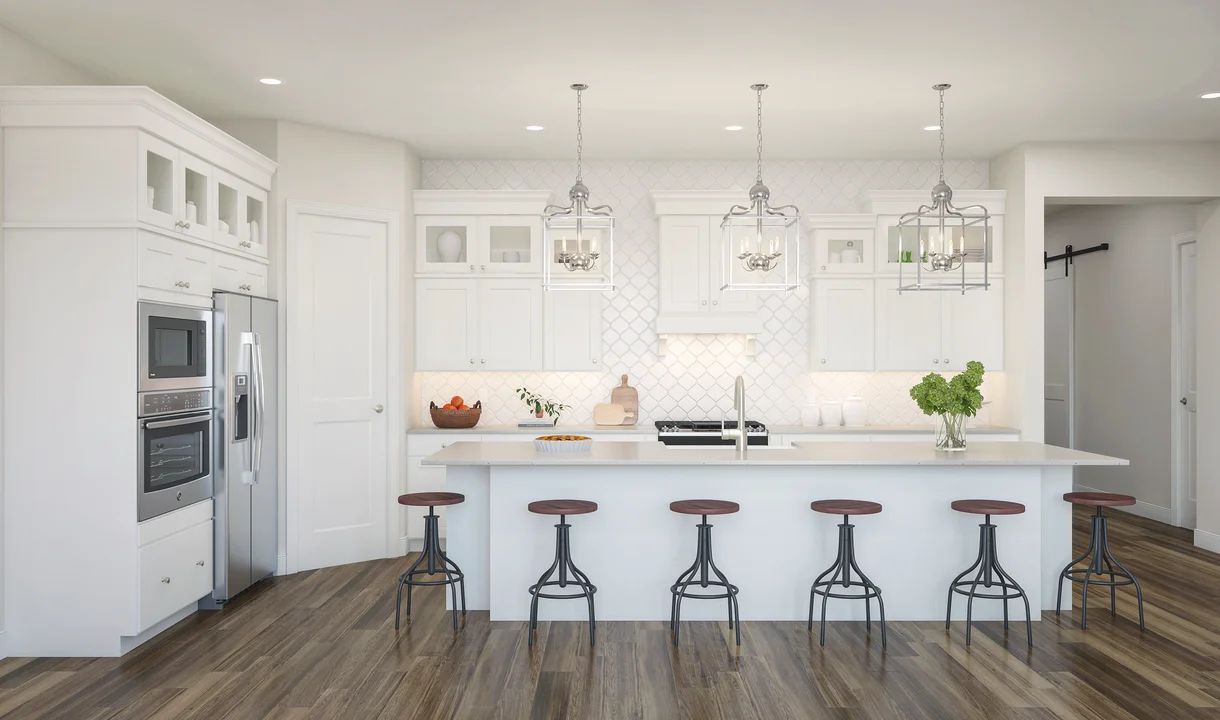 Kitchen with pendant lighting and upper glass cabinets