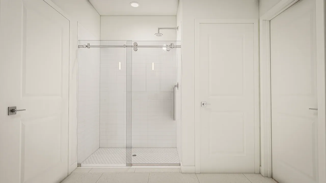 Glass shower enclosure in primary bath