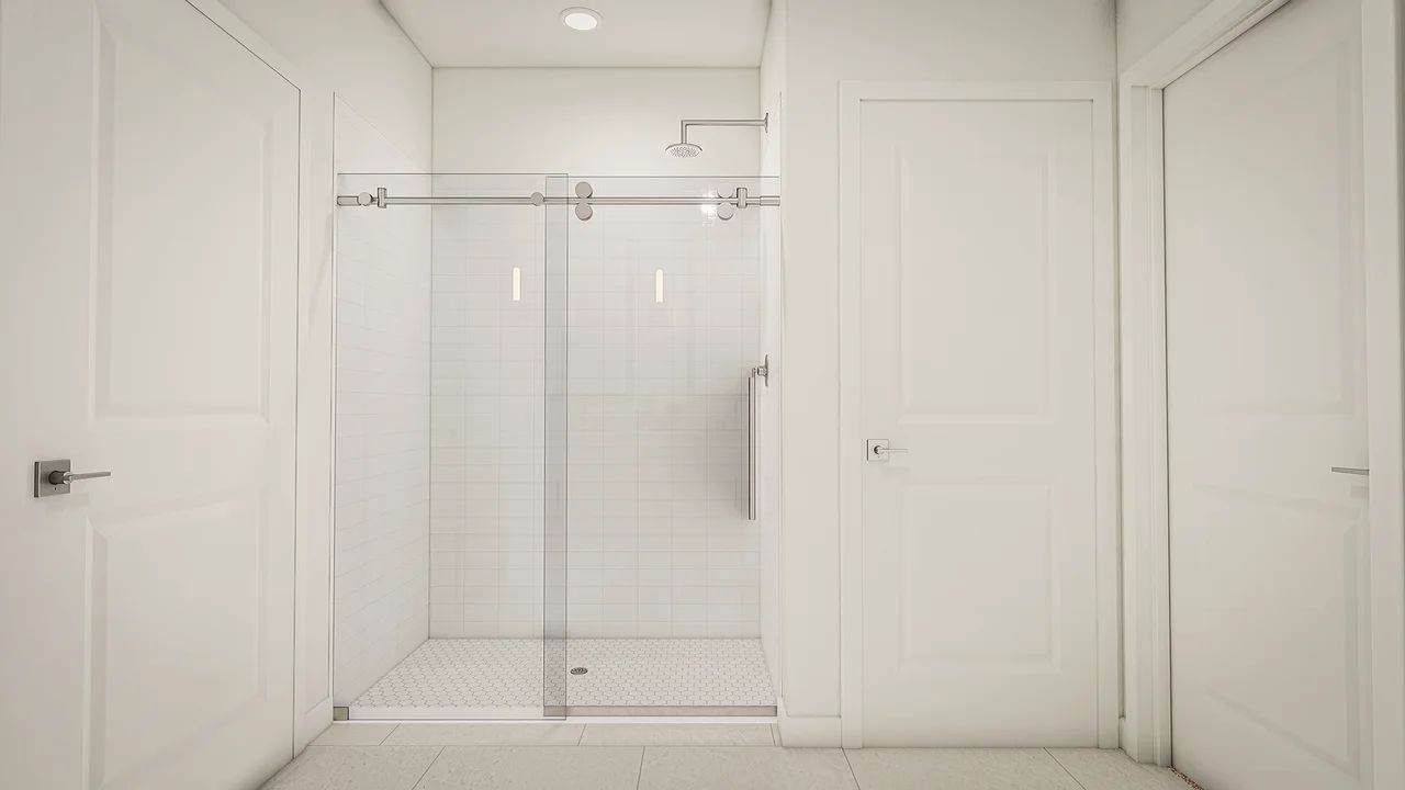 Glass shower enclosure in primary bath