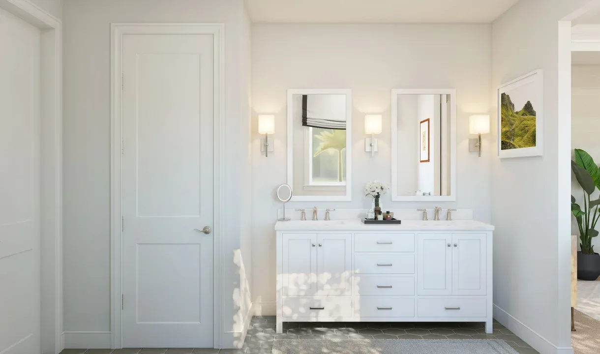 Primary bath featuring freestanding vanity with dual sinks