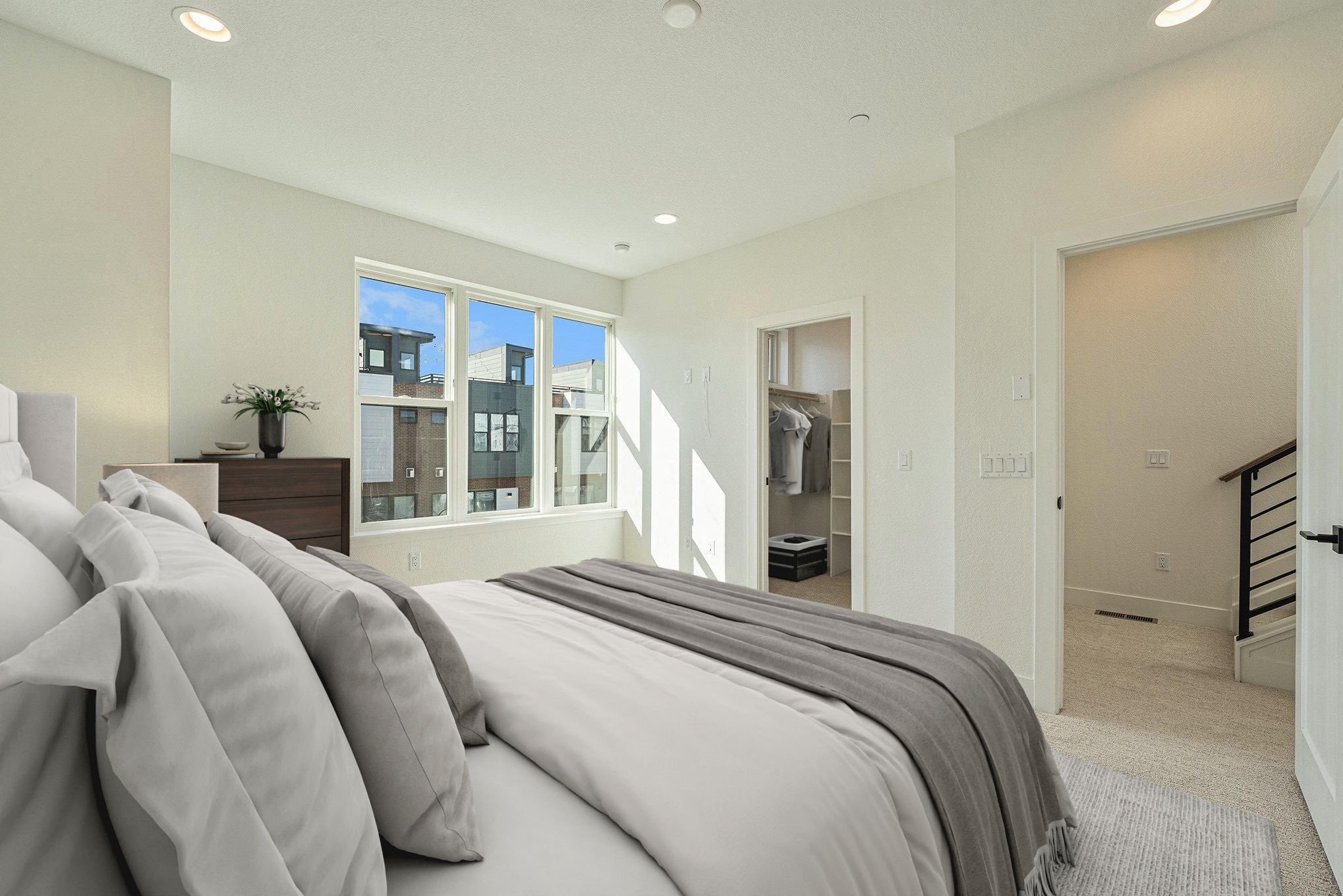 Photos including furniture are virtually staged; furniture is not included with this home.