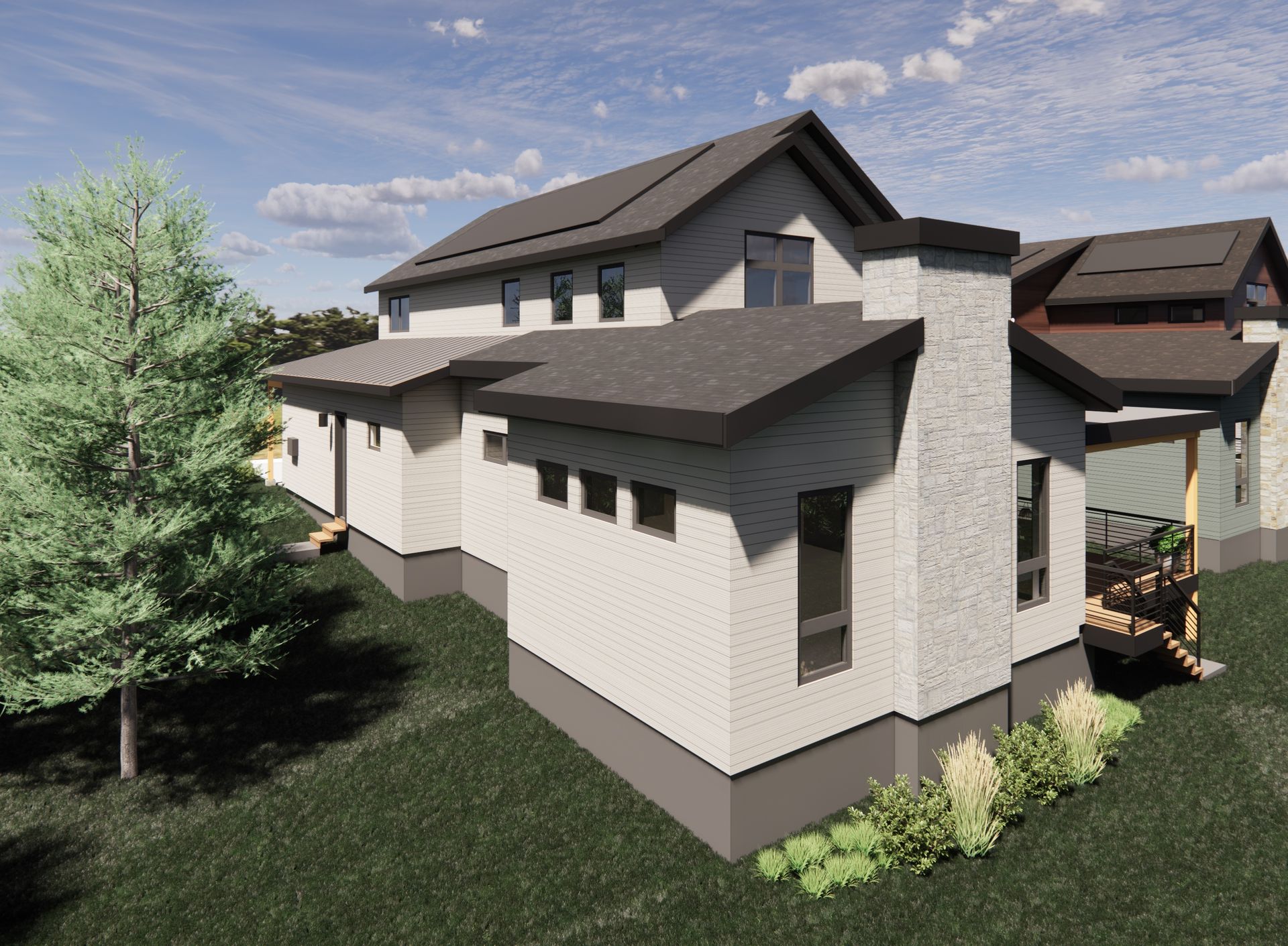 A look at the home’s serene rear elevation, featuring large windows, a covered deck, and beautifully integrated outdoor living areas. Enjoy peaceful foothills surroundings, lush landscaping, and seamless indoor–outdoor flow from the main living spaces.