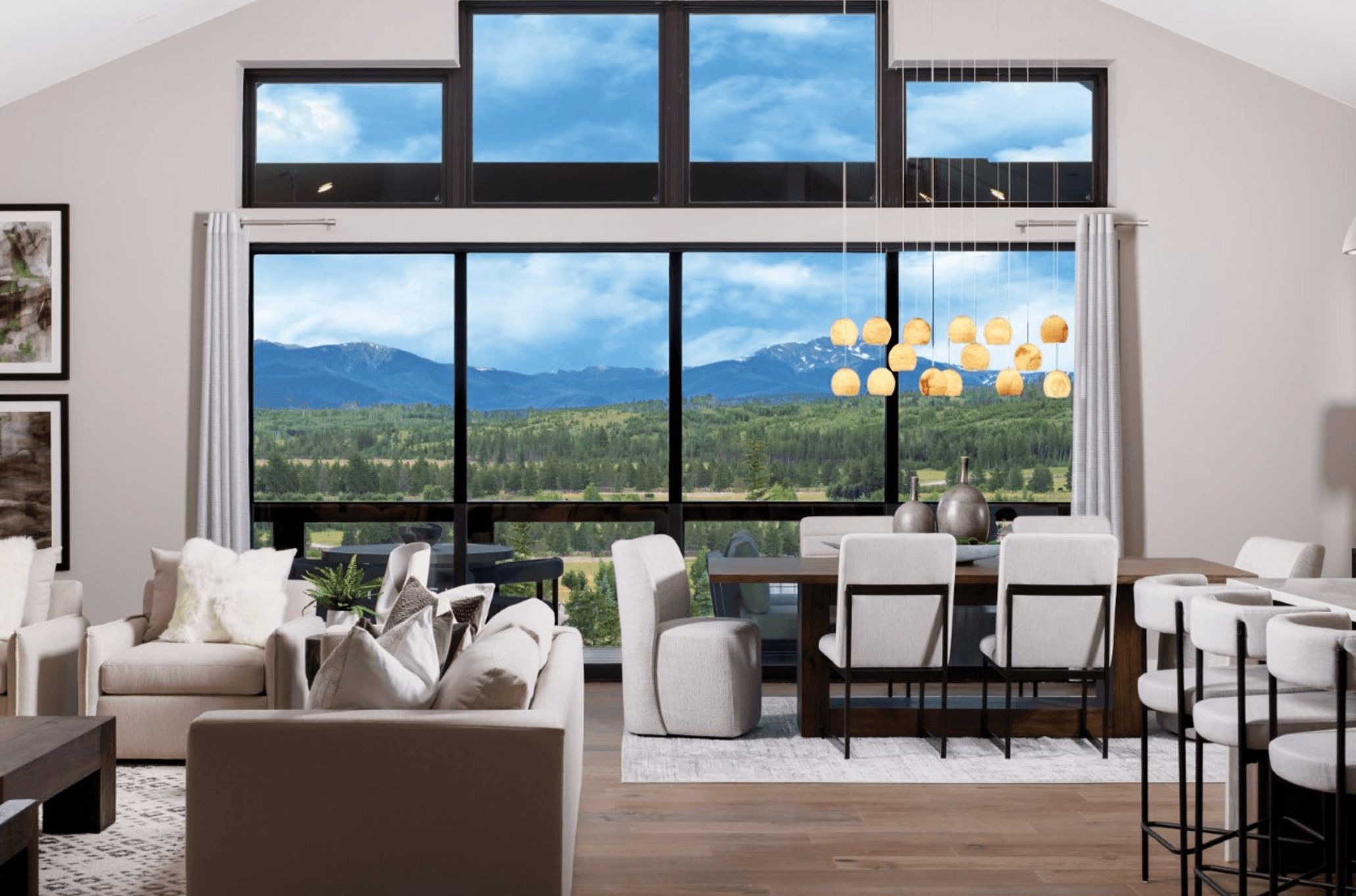The dining area is conveniently located by a multi-slide door that opens fully into one panel, seamlessly connecting to the patio. Enjoy expansive views and effortless indoor-outdoor living that expands the space for dining and entertaining.