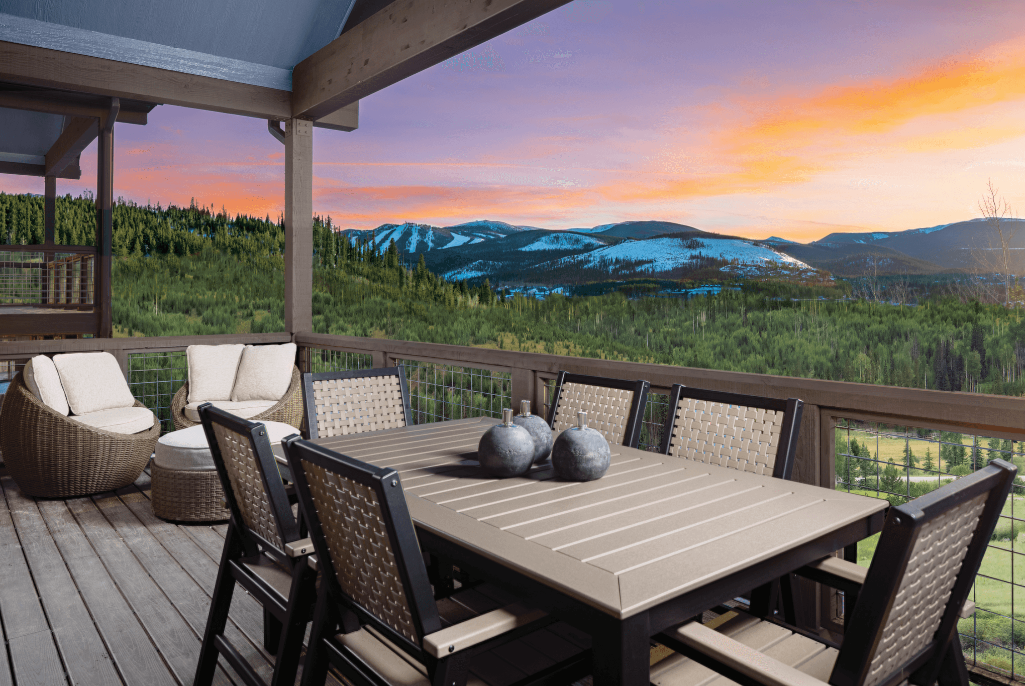 The lower patio features an expansive deck designed to accommodate a full-sized hot tub, offering the perfect place to unwind while taking in full, sweeping views.