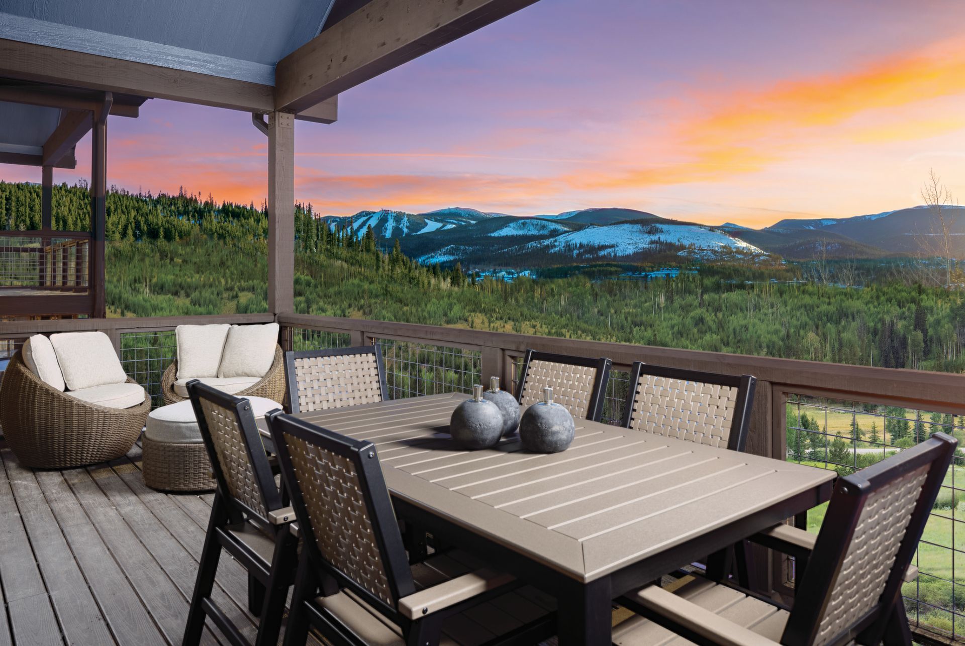 The lower patio features an expansive deck designed to accommodate a full-sized hot tub, offering the perfect place to unwind while taking in full, sweeping views.