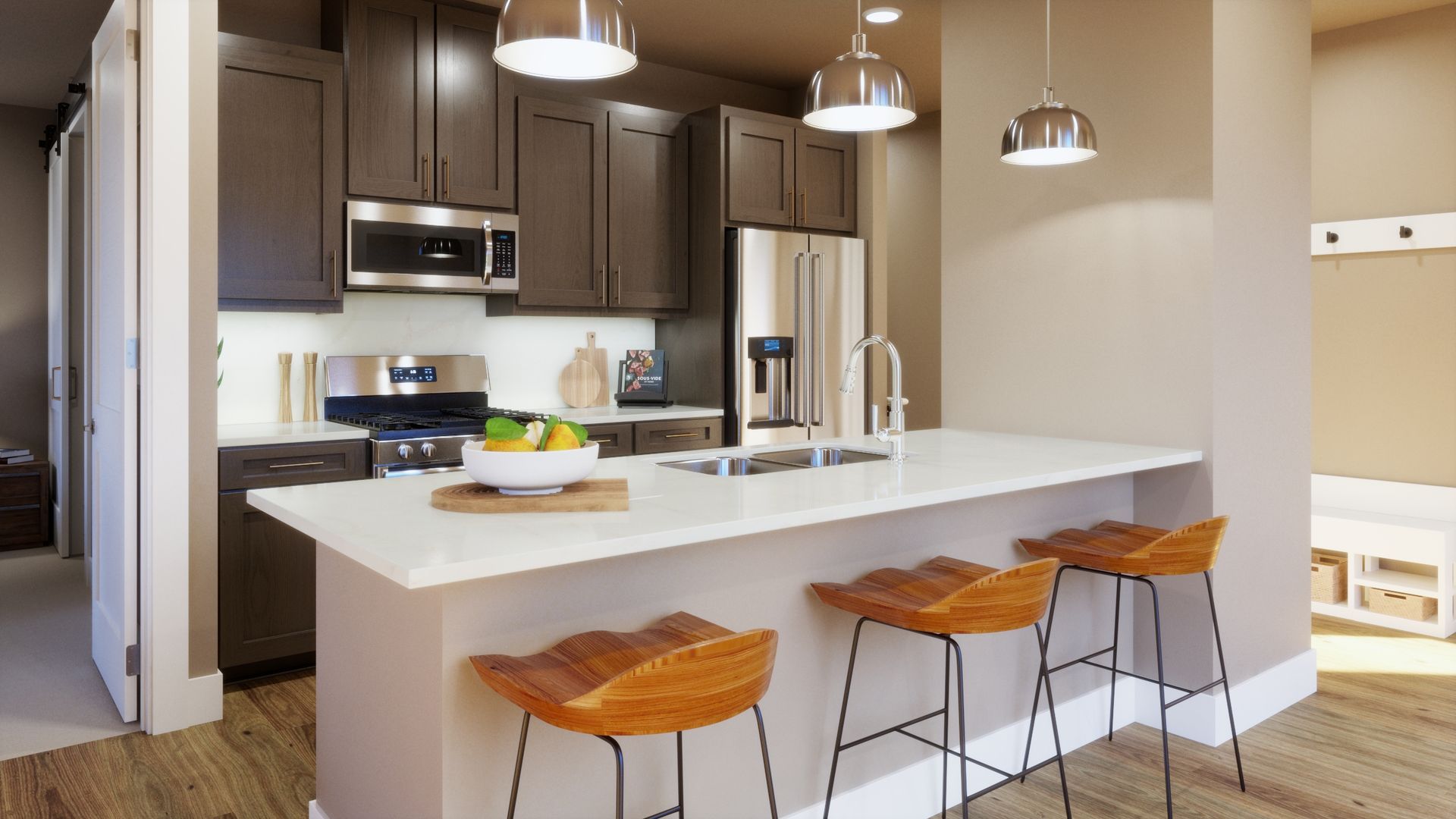 Designed for easy everyday living. This open kitchen features a spacious island with seating, ample cabinetry, and a functional layout that makes cooking, entertaining, and gathering feel effortless.