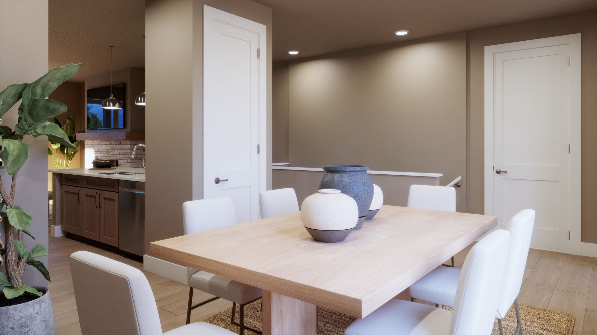 Tucked just around the corner from the kitchen, this inviting dining space offers a dedicated place to gather while maintaining an easy connection to the home’s open main-level living areas.