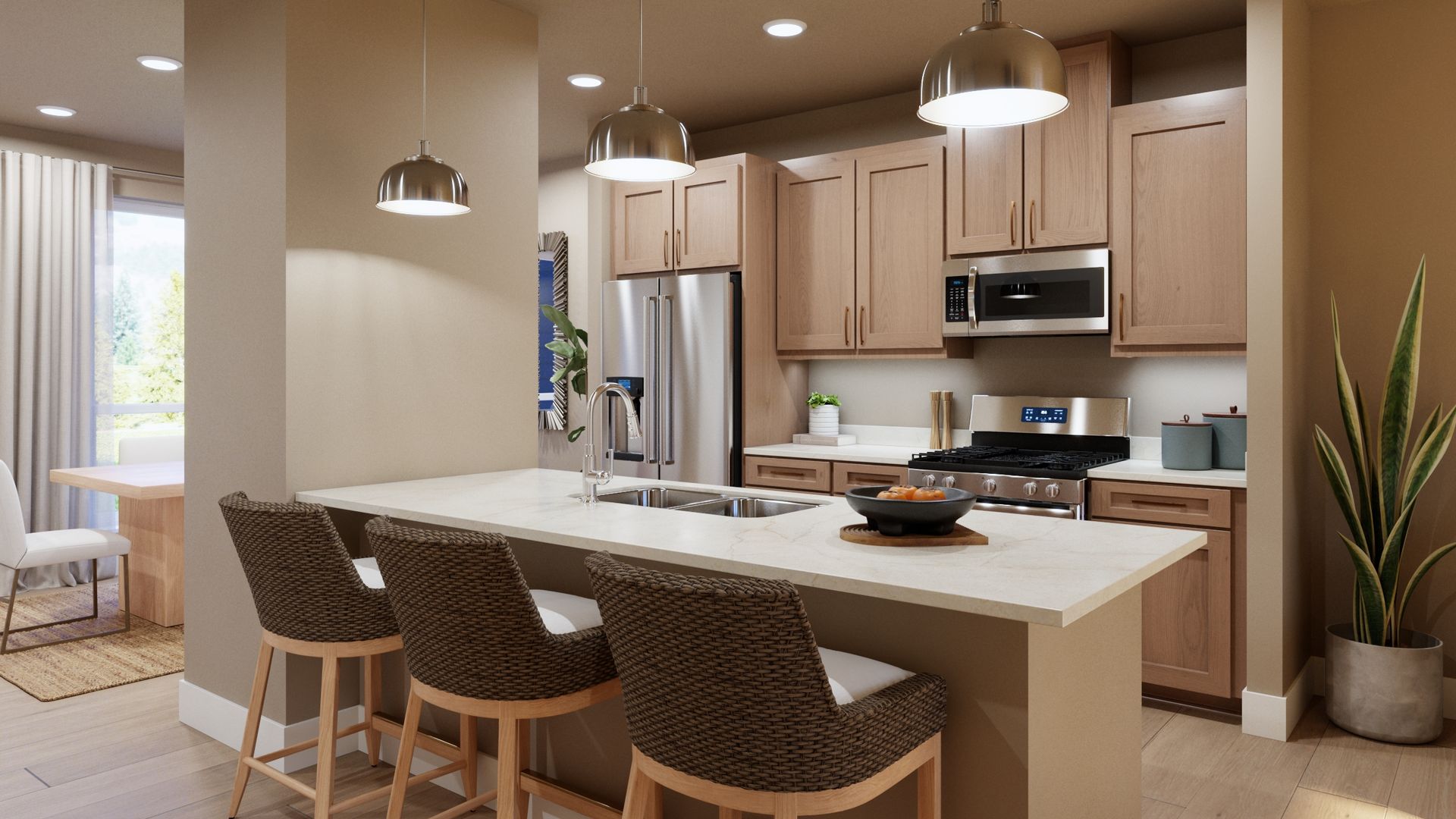 Designed for convenient main-floor living. This welcoming kitchen features a spacious island with seating, ample cabinetry, and a functional layout that makes everyday meals and entertaining effortless.