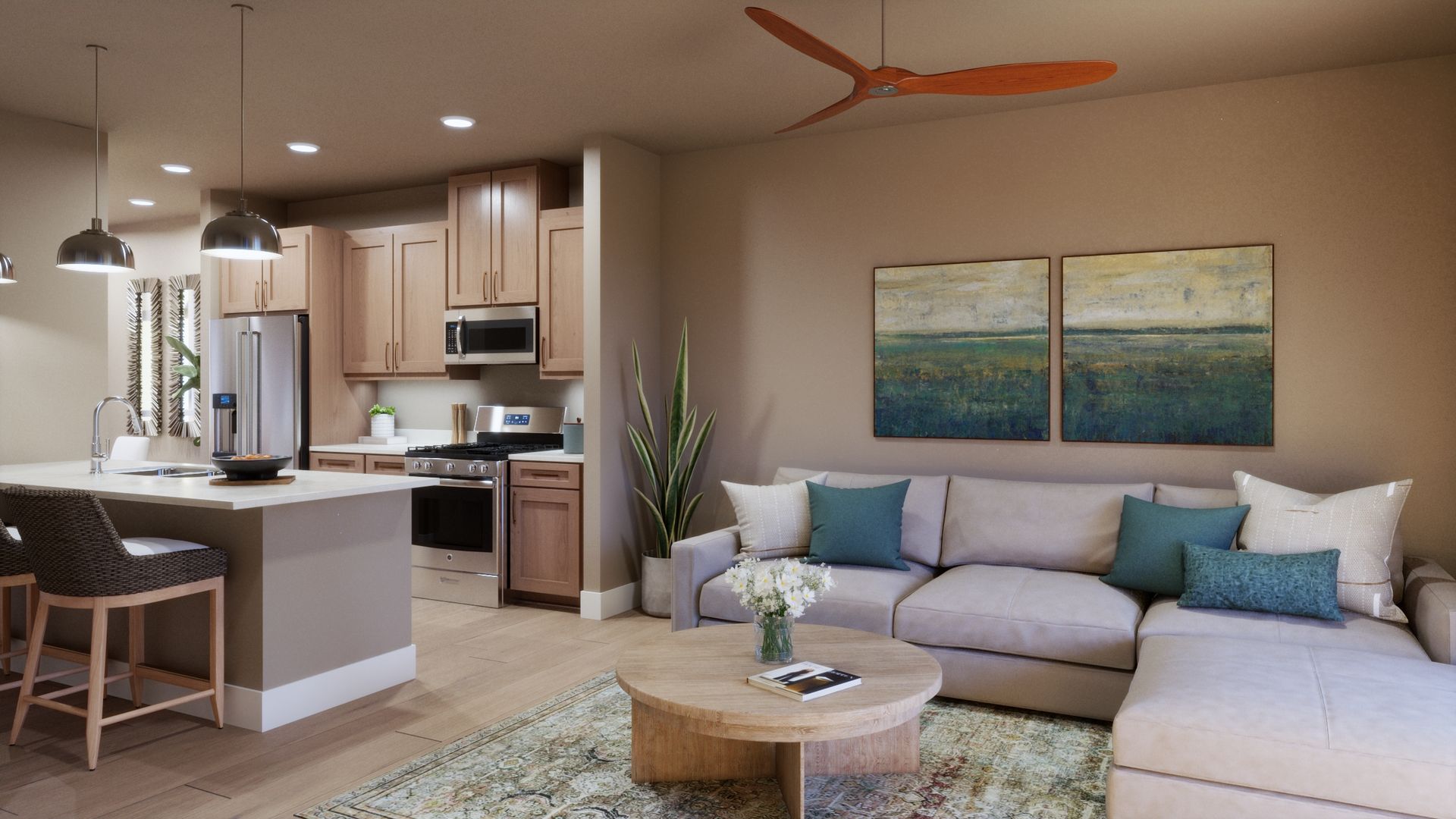 Open and inviting, this main-level living room connects seamlessly with the kitchen, creating a comfortable space for relaxing, entertaining, and gathering together.