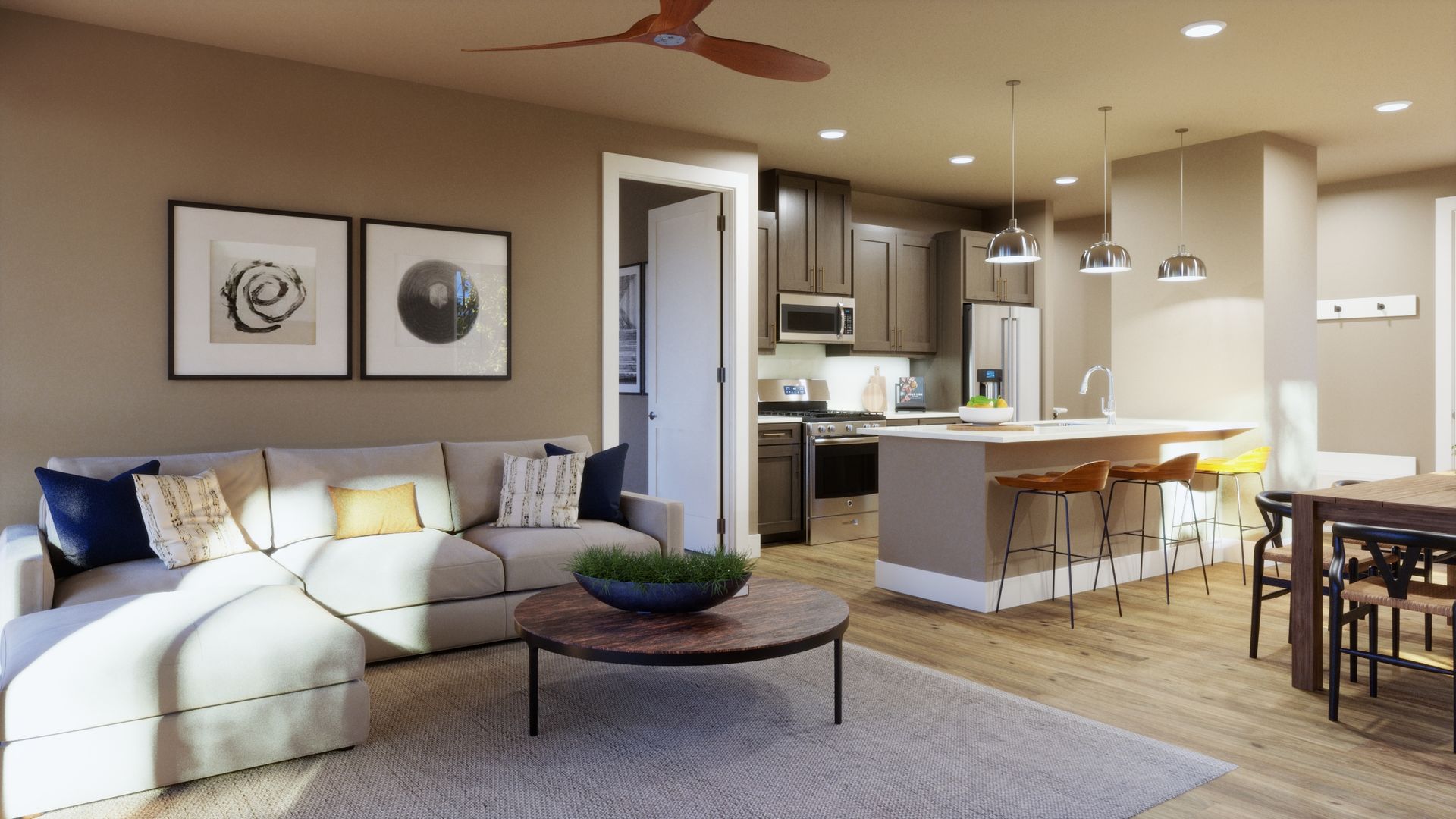 Open, inviting, and designed for connection. This main-floor living room flows seamlessly into the kitchen and dining areas, creating a comfortable space for relaxing, entertaining, and everyday living.