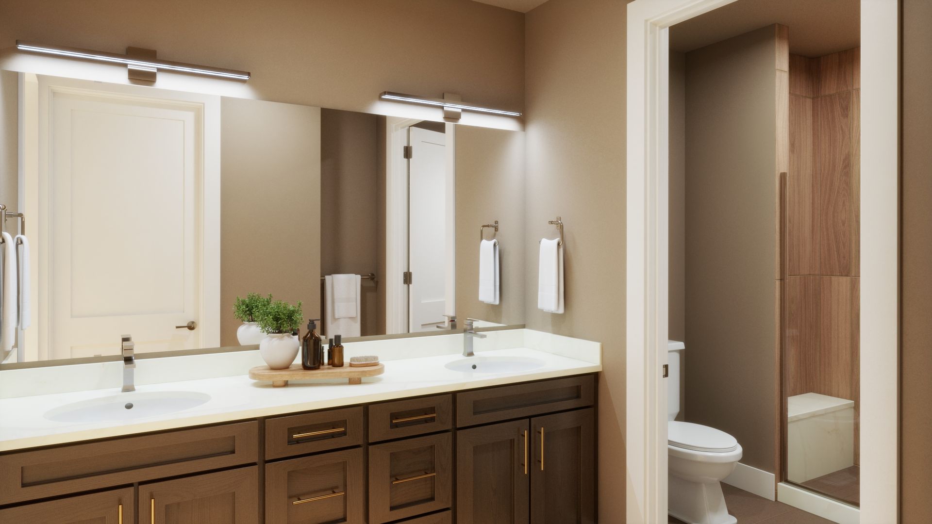 Designed for comfort and added privacy, this primary bath features dual vanities and a thoughtfully separated shower area, creating a functional space for everyday living.