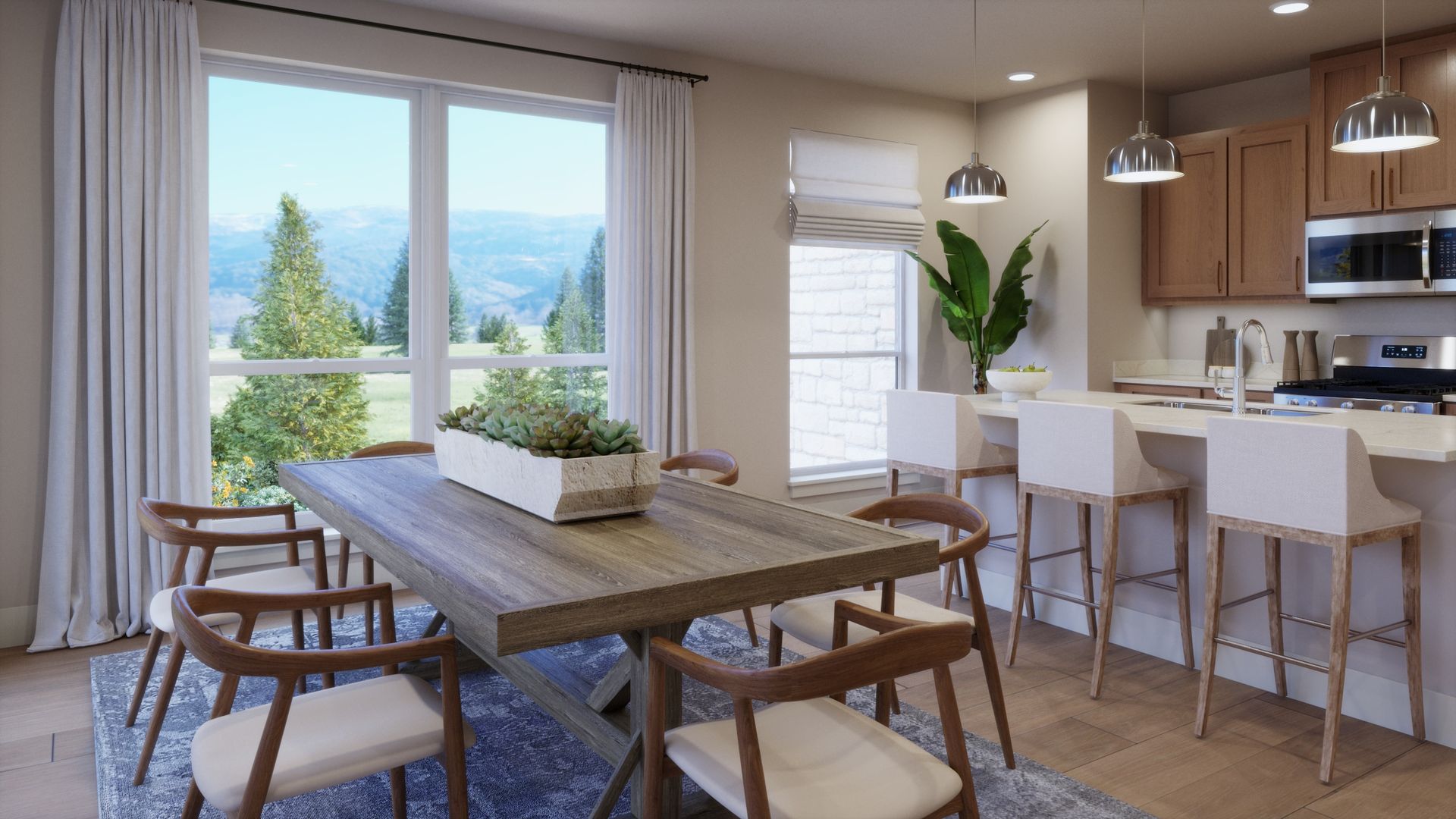Designed for gathering and connection. This inviting dining space flows seamlessly into the kitchen, creating an open and welcoming setting for everyday meals, entertaining, and time spent together.