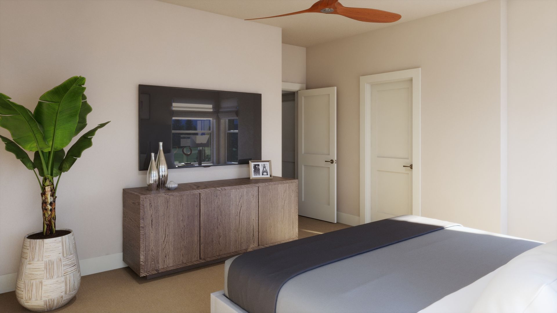 A peaceful retreat on the third floor. This spacious primary bedroom features abundant natural light and a warm, modern design, creating a comfortable place to relax and unwind.