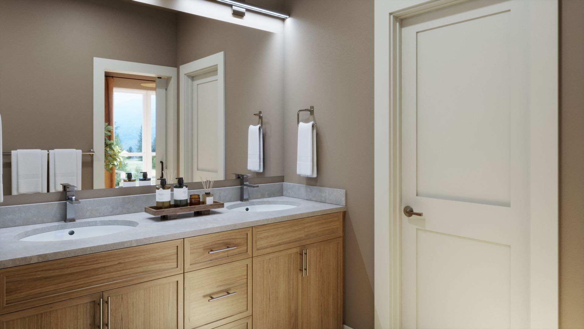 A primary bath designed for everyday comfort. Dual vanities, warm finishes, and thoughtful details create a clean and functional space to start and end your day.