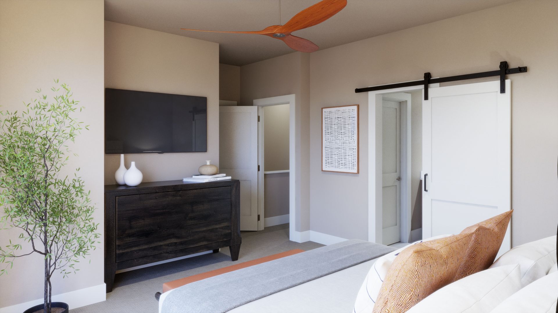 Located on the third floor, this spacious primary bedroom offers a peaceful retreat with abundant natural light and a warm, inviting design.