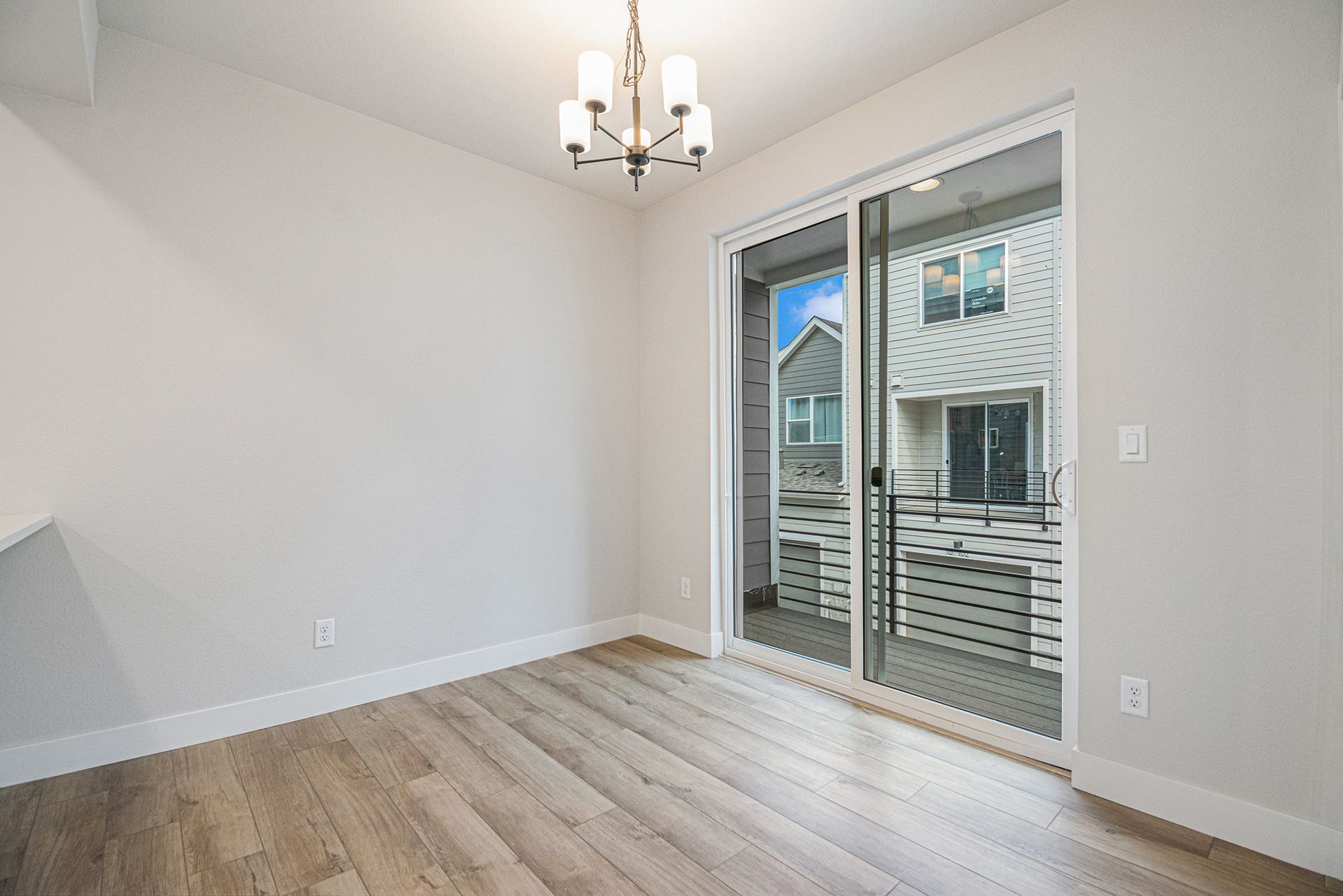 Dining room leading to covered balcony