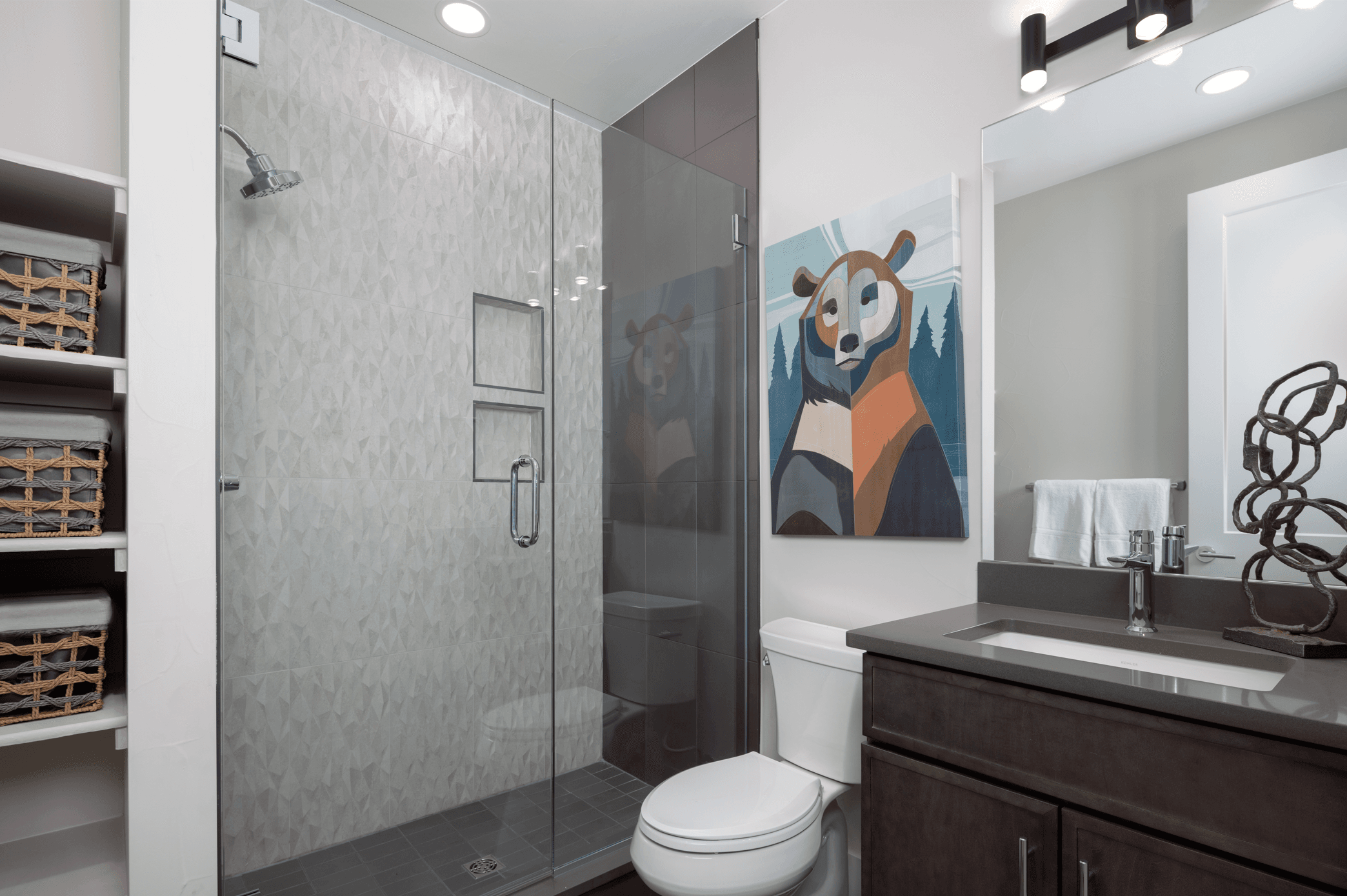 Bath 2 is a well-appointed space designed for comfort and convenience, featuring modern finishes and serving as the private ensuite for Bedroom 2.