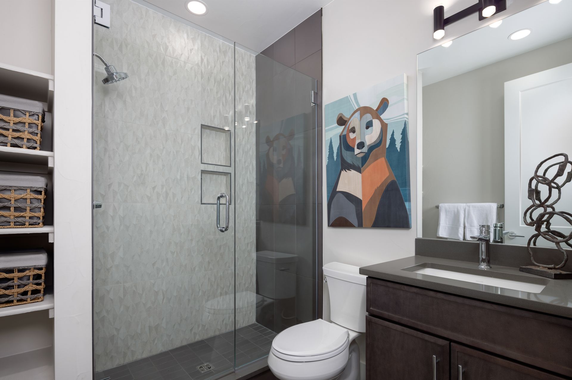 Bath 2 is a well-appointed space designed for comfort and convenience, featuring modern finishes and serving as the private ensuite for Bedroom 2.