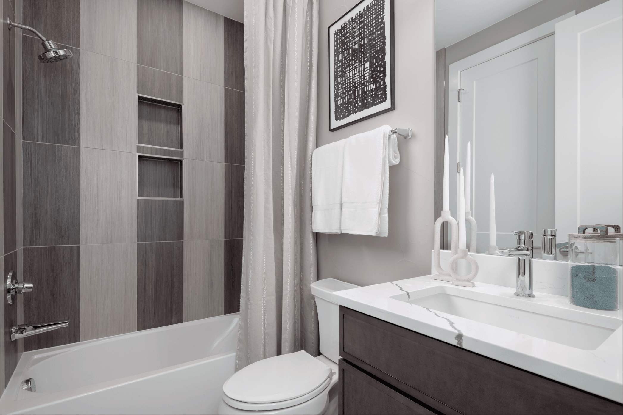 Bath 3 is a shared Jack and Jill bathroom, thoughtfully designed for convenience and easy access from Bedroom 3 and the family/rec room, blending functionality with modern comfort.