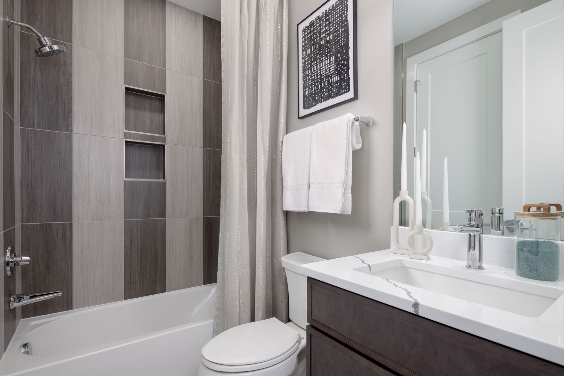 Bath 3 is a shared Jack and Jill bathroom, thoughtfully designed for convenience and easy access from Bedroom 3 and the family/rec room, blending functionality with modern comfort.