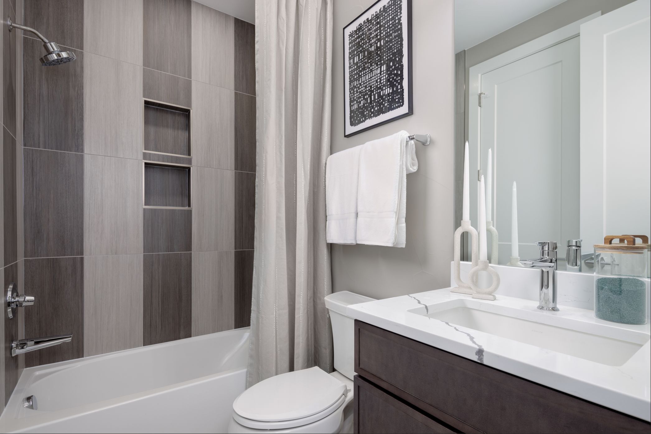 Bath 3 is a shared Jack and Jill bathroom, thoughtfully designed for convenience and easy access from Bedroom 3 and the family/rec room, blending functionality with modern comfort.