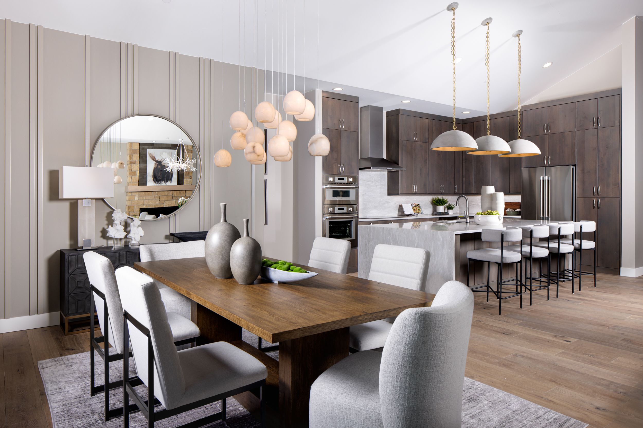 The dining area is conveniently located by a multi-slide door that opens fully into one panel, seamlessly connecting to the patio. Enjoy expansive views and effortless indoor-outdoor living that expands the space for dining and entertaining.