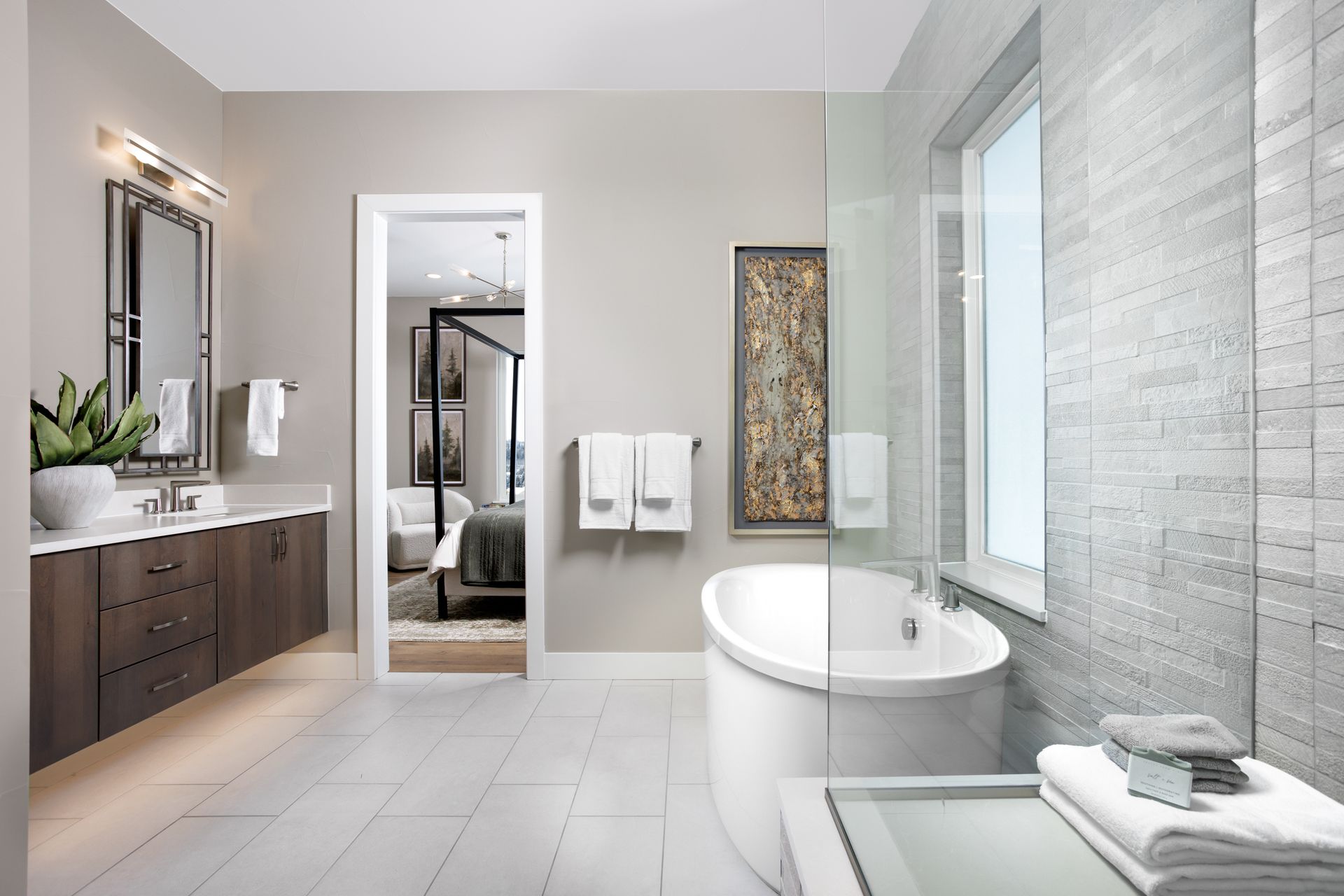 Primary Bath 1 features a spacious walk-in shower and a relaxing soaking tub, creating a serene retreat designed for comfort and everyday luxury.
